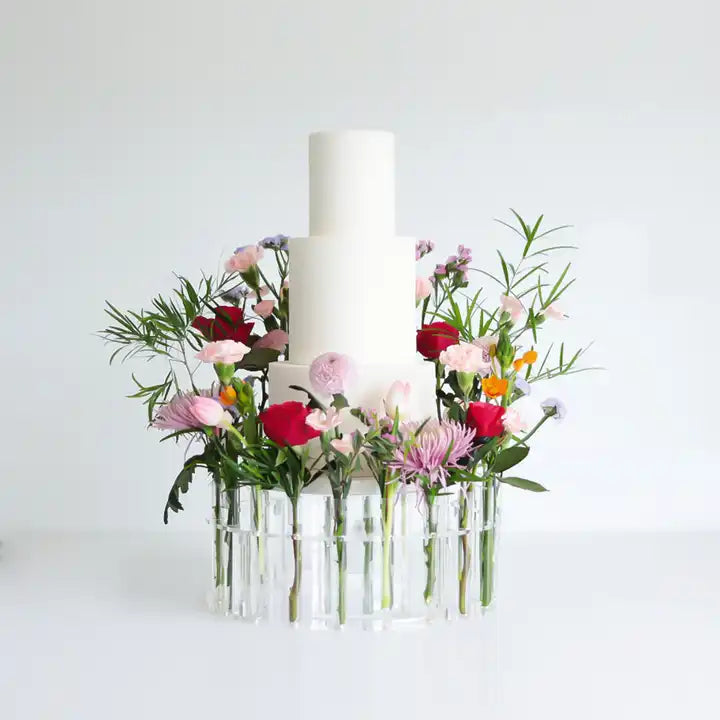 Leie kakestativ med sylinder for blomster