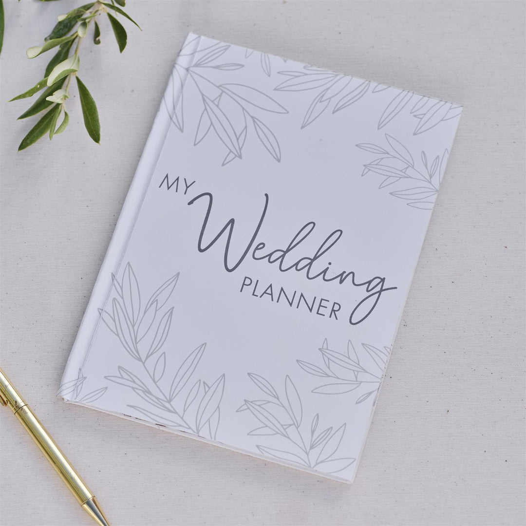 Hvit bryllupsplanlegger-notatbok